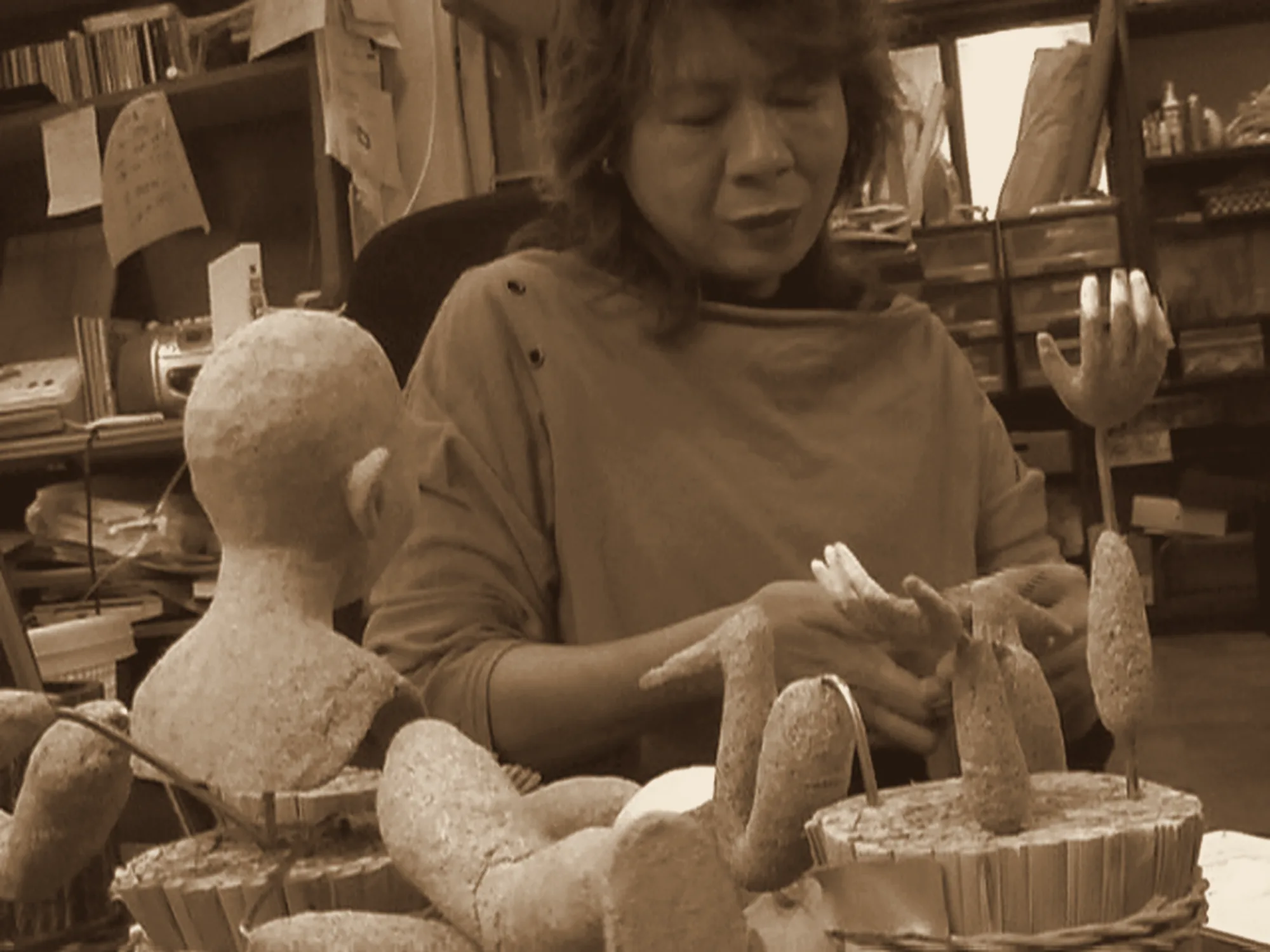 Ishii Michiko at work on the clay prototype of a doll